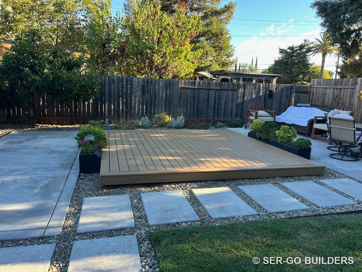 Finished low composite deck with picture-frame border, after