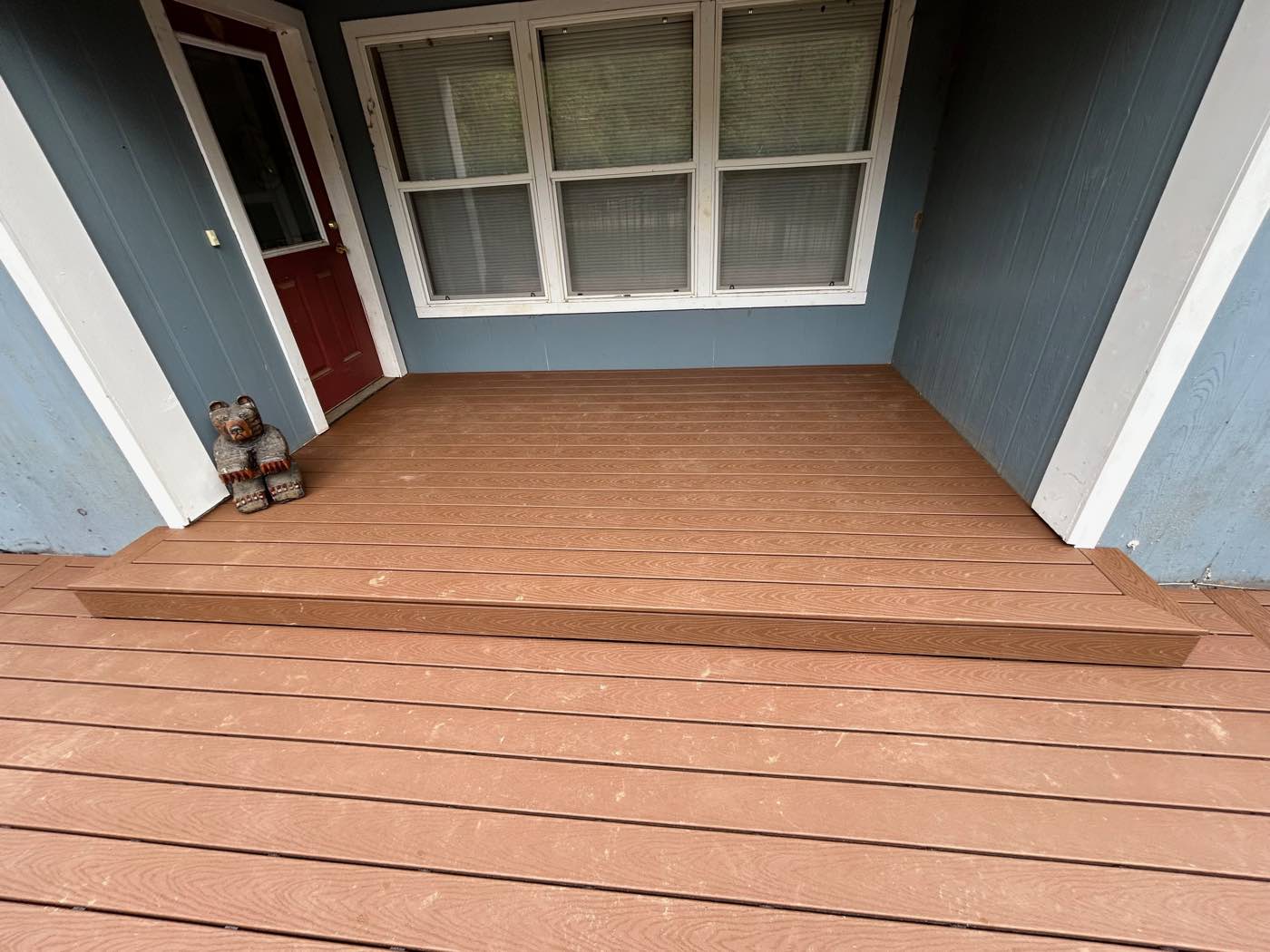 Composite front porch with a single step