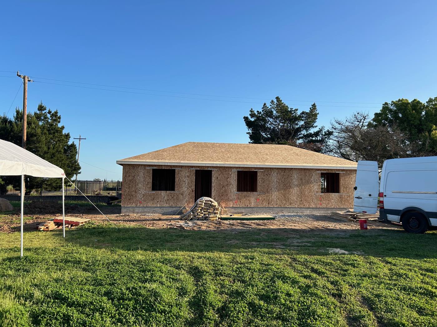 New ground-up home with hip roof and OSB sheathing