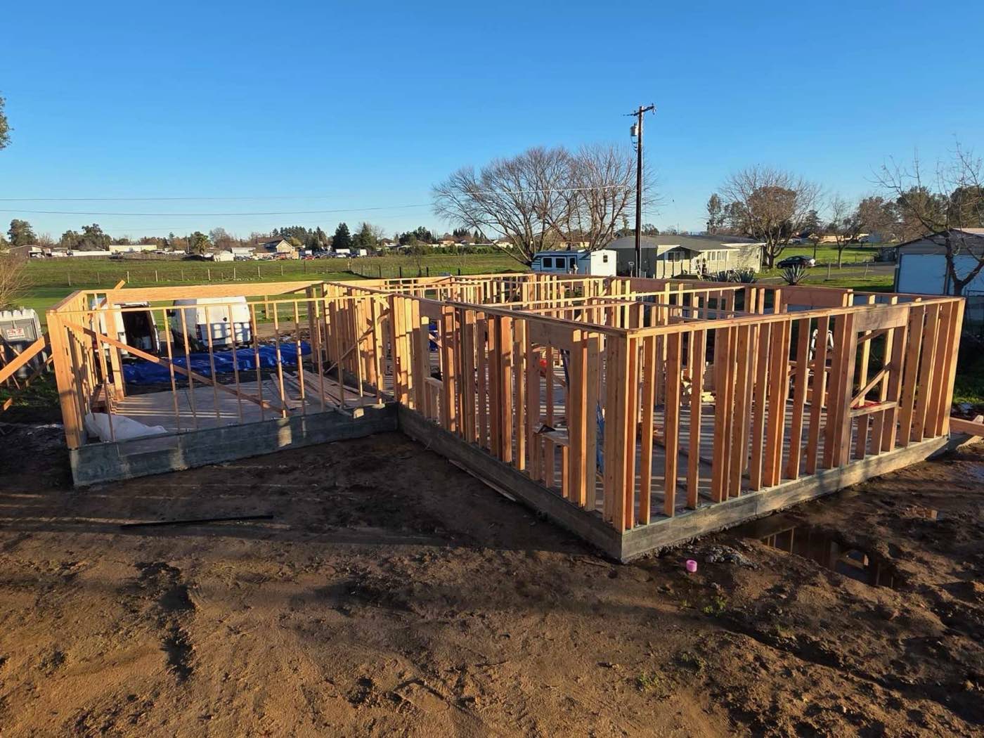 Exterior walls framed and standing on a new concrete slab