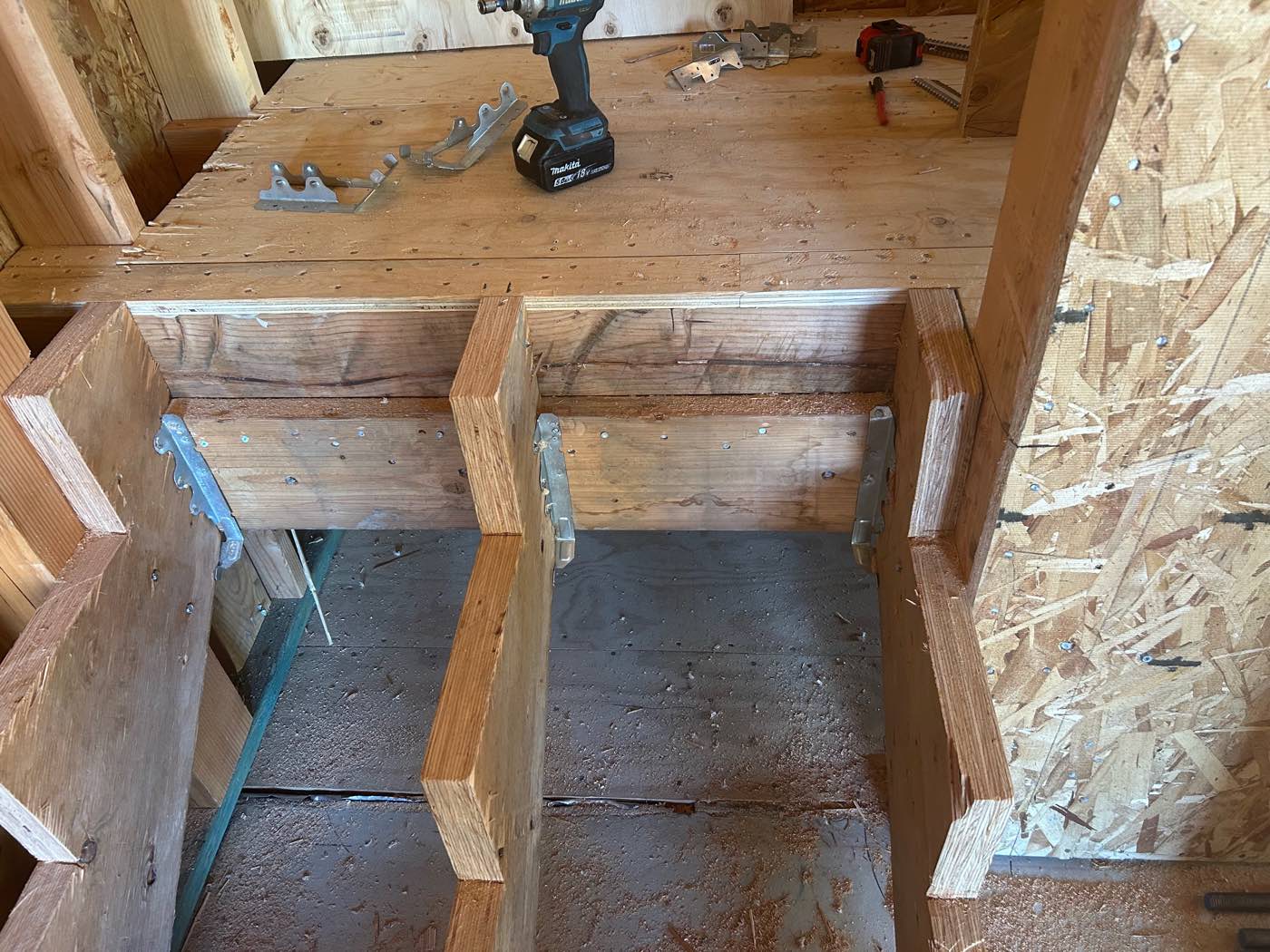 Interior stair stringers and framing detail inside a new structure